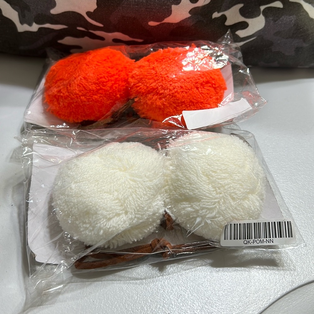 Two Brand New Pom Poms
